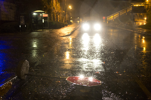 A stop sign blows over in front of the stairs to Flint and Day Halls in the aftermath of Hurricane-turned Superstorm Sandy Tuesday night. Syracuse University canceled classes part of Monday and all of Tuesday, but the storm did little damage to the Syracuse area.