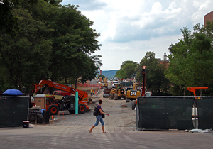 Numerous pieces of construction equipment line University Place as the university enters its final month of work on the promenade, which will be completed Aug. 22.