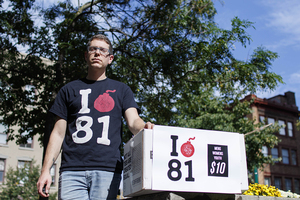 About 100 people, including Damian Vallelonga, attended a rally to replace the Interstate 81 viaduct that bisects Syracuse. 