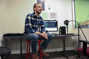 Marcus Suraci creates music in the Makerspace at Onondaga County Public Library.