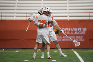 Stephen Rehfuss (No. 29) tallied a goal and an assist in Syracuse's overtime win.