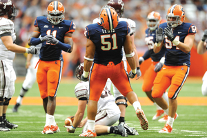 Andrew Lewis (51) and the Syracuse football team will look to become bowl-eligible for the first time since 2004 with a win over Louisville Saturday.