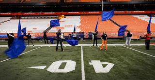 Caysie Myers, an SU sophomore, waits for her flag to drop. 