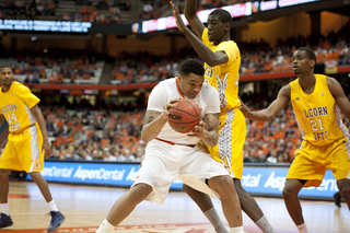 DaJuan Coleman attempts to post up an Alcorn State defender on the low block.