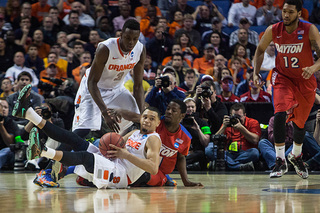 Ennis collects a loose ball and looks up to find an open teammate. 