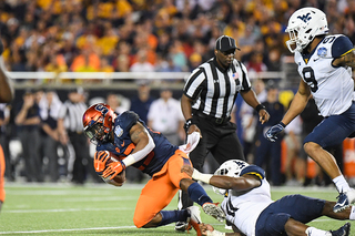 Adams split time in the backfield with Moe Neal, Dontae Strickland and Jarveon Howard.