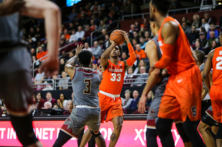 Elijah Hughes gears up for a shot. He scored 10 points. 