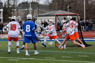 Syracuse's defense stops a shot. 