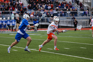 Brett Kennedy protects the ball. 