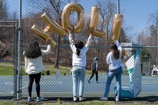 The e-board members of SASA prepare decorations by fastening the balloons spelling 