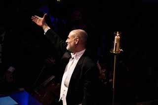 Hendricks Chapel Choir director, José “Peppie” Calvar, leads the choir in a number of holiday tunes throughout the night. Calvar was the conductor for all of the performances done by the Hendricks Chapel Choir. 